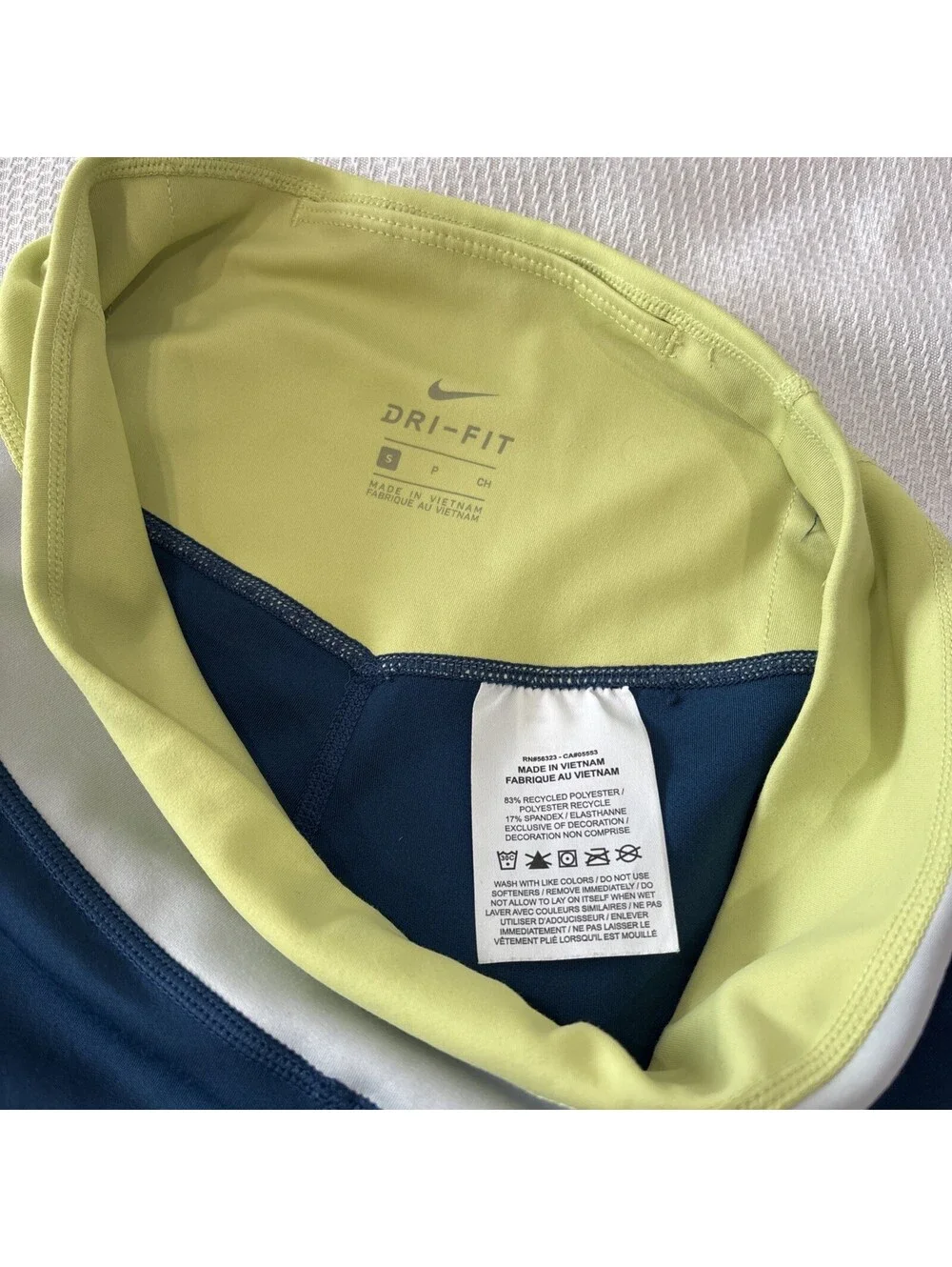 NIKE SMALL BLUE YELLOW GRAY COLOR BLOCK HIDDEN BACK POCKET DRI FIT LEGGINGS